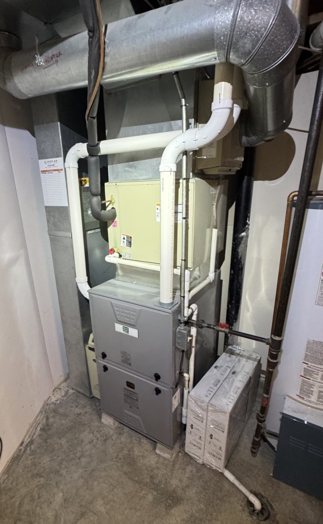 Day & Night gas furnace and coil installed in a basement with new PVC venting and ductwork